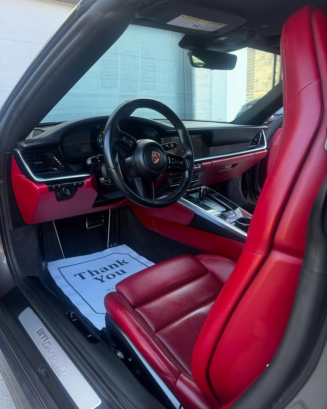 Porsche interior with red leather seats after detailing