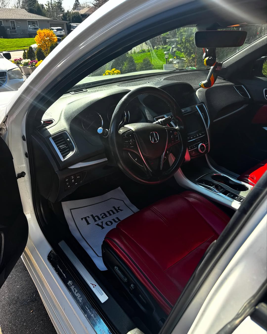 Acura interior with red accents after cleaning